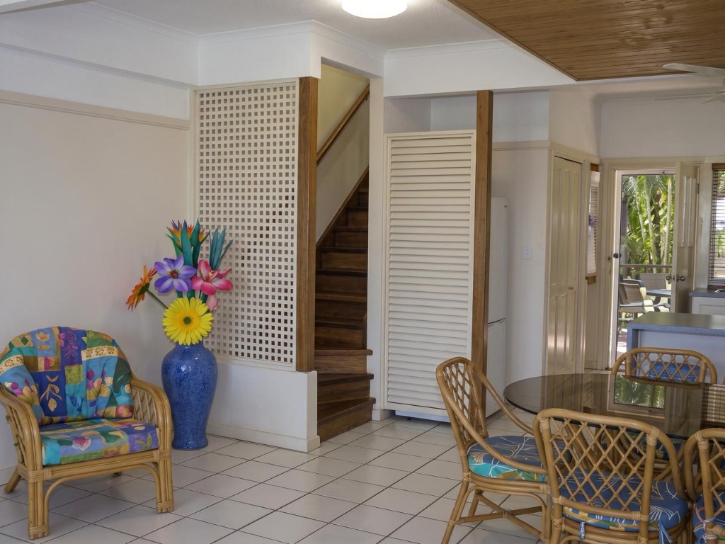 Villa living and dining area with rattan furniture
