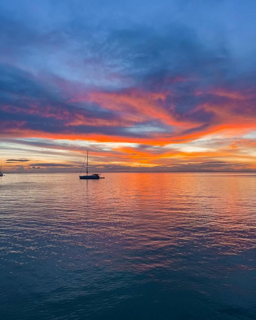 Sunset sailboat off Tangalooma